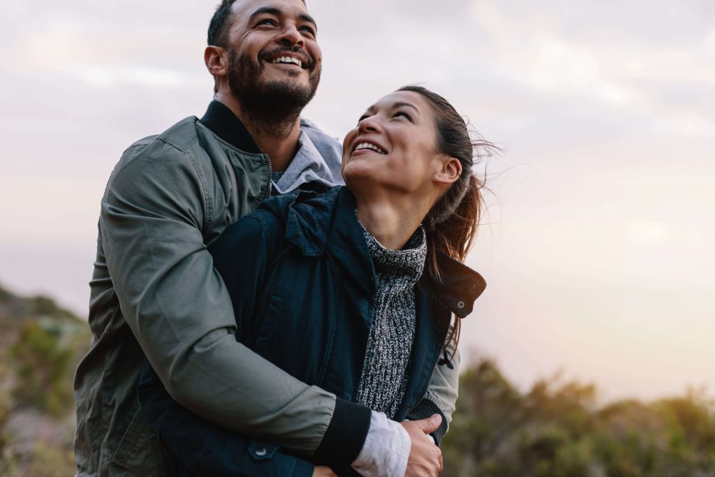 Happy couple outside.